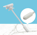 Manual beverage pumping device with long straw and blue press handle on a colour box.