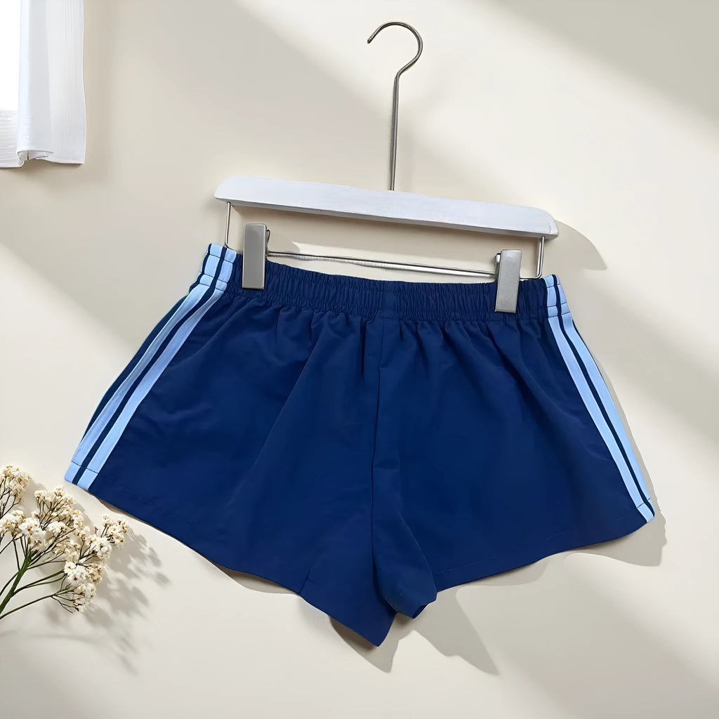 Men's navy blue nylon sport shorts with high-waist elastic waistband