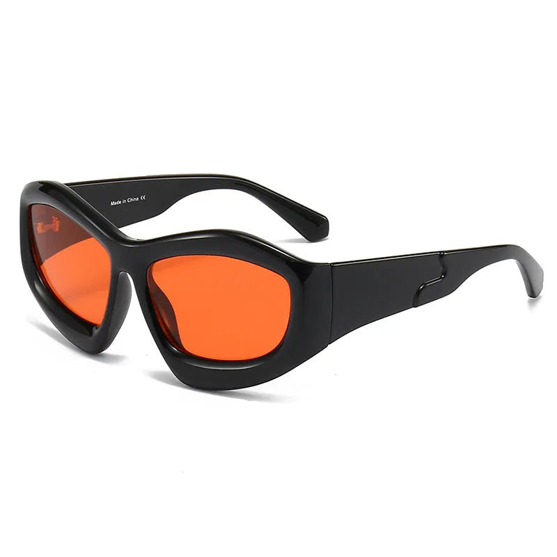 Concave shape sunglasses with bubble lens in multiple colour combinations including black, blue, red and yellow.