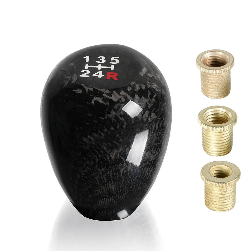 Carbon fibre aluminium alloy gear shift knob on black background for manual transmission cars