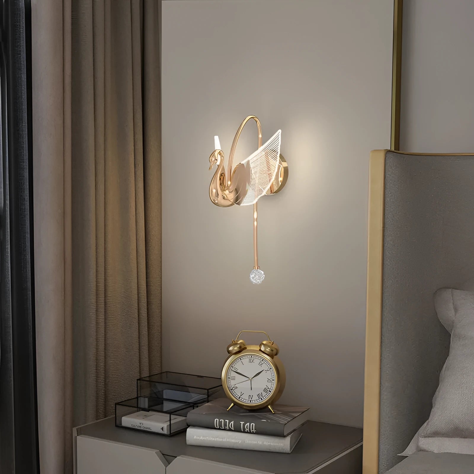 Gold minimalist swan silhouette wall lamp with acrylic shade and dimmable LED light.