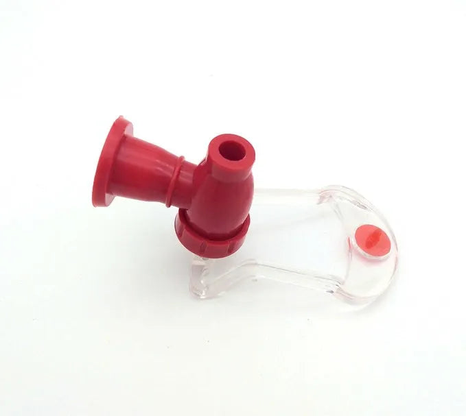 Red Magic Tap soda dispenser pump attached to a 2 litre bottle