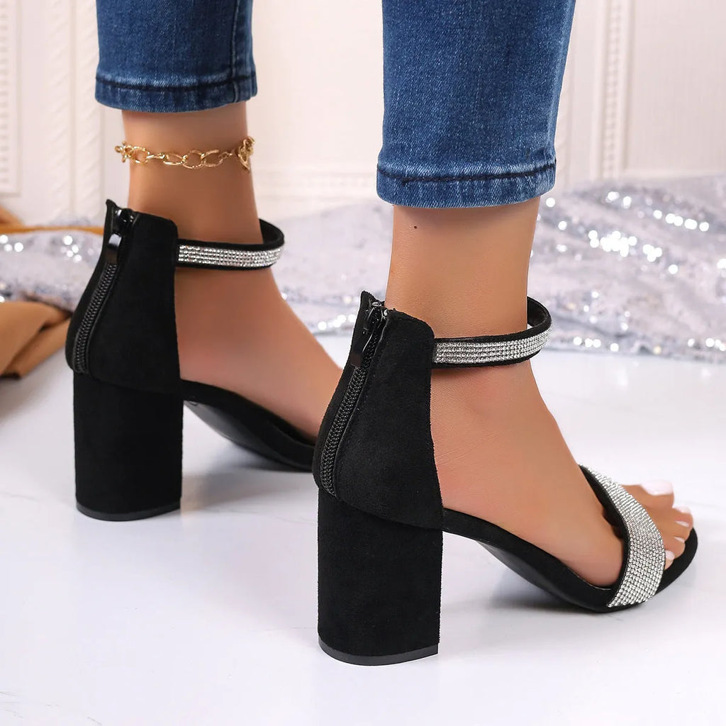 Rhinestone chunky square heel sandals in black suede with open toe and strappy design, side view