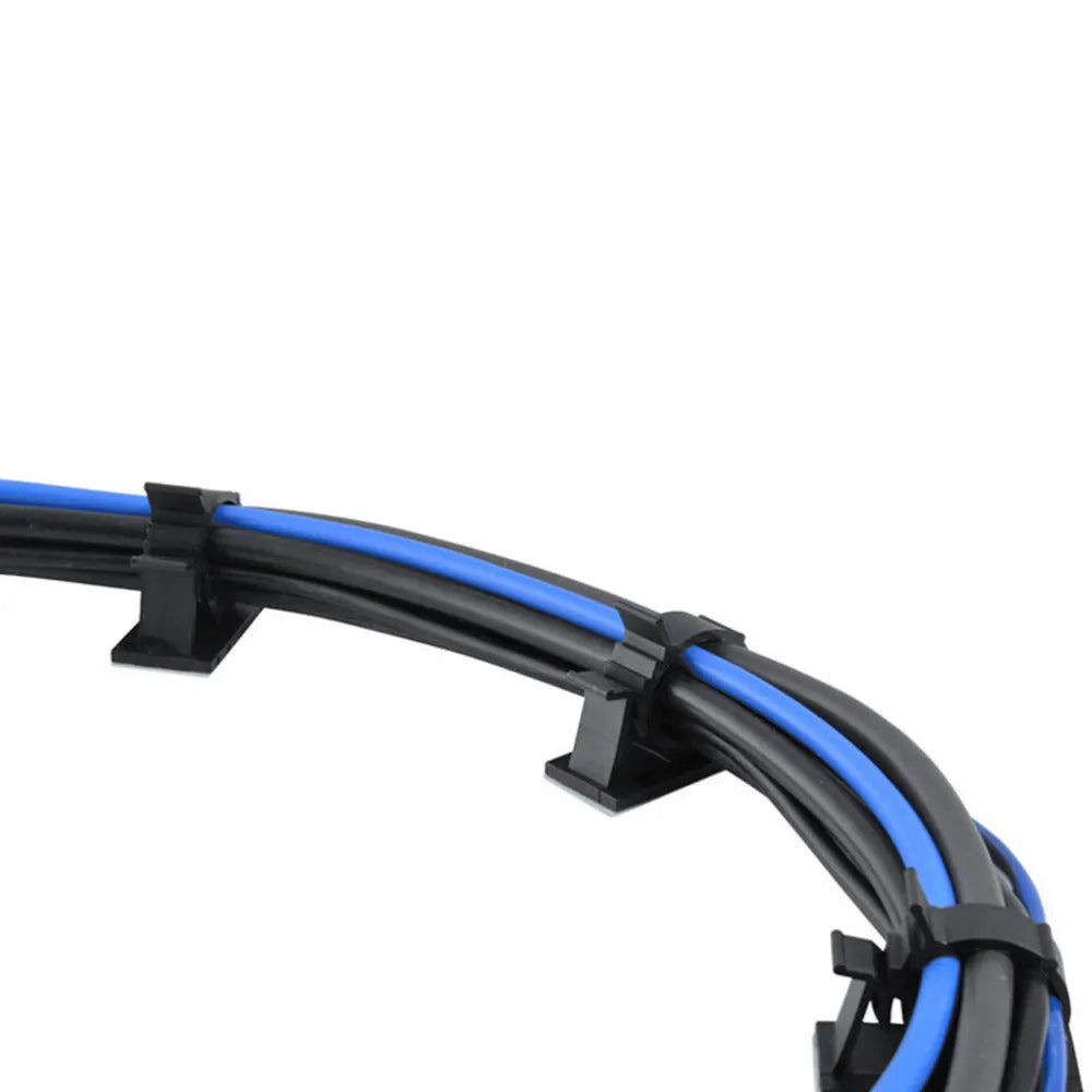 Black nylon adhesive cable clamps on a white background, showing self-adhesive backing and two-stage lock design.