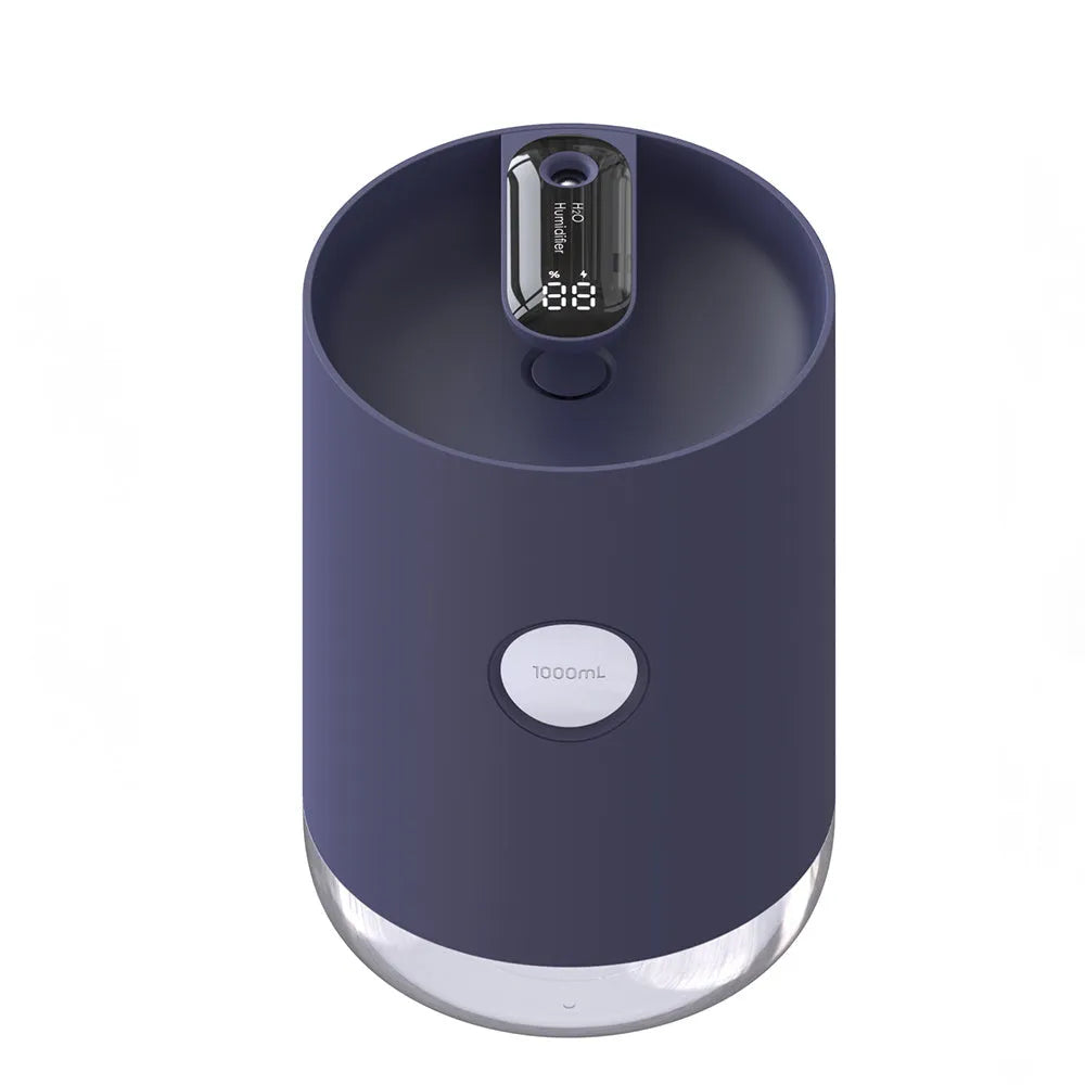 A blue wireless humidifier with a USB cable on a wooden desk.