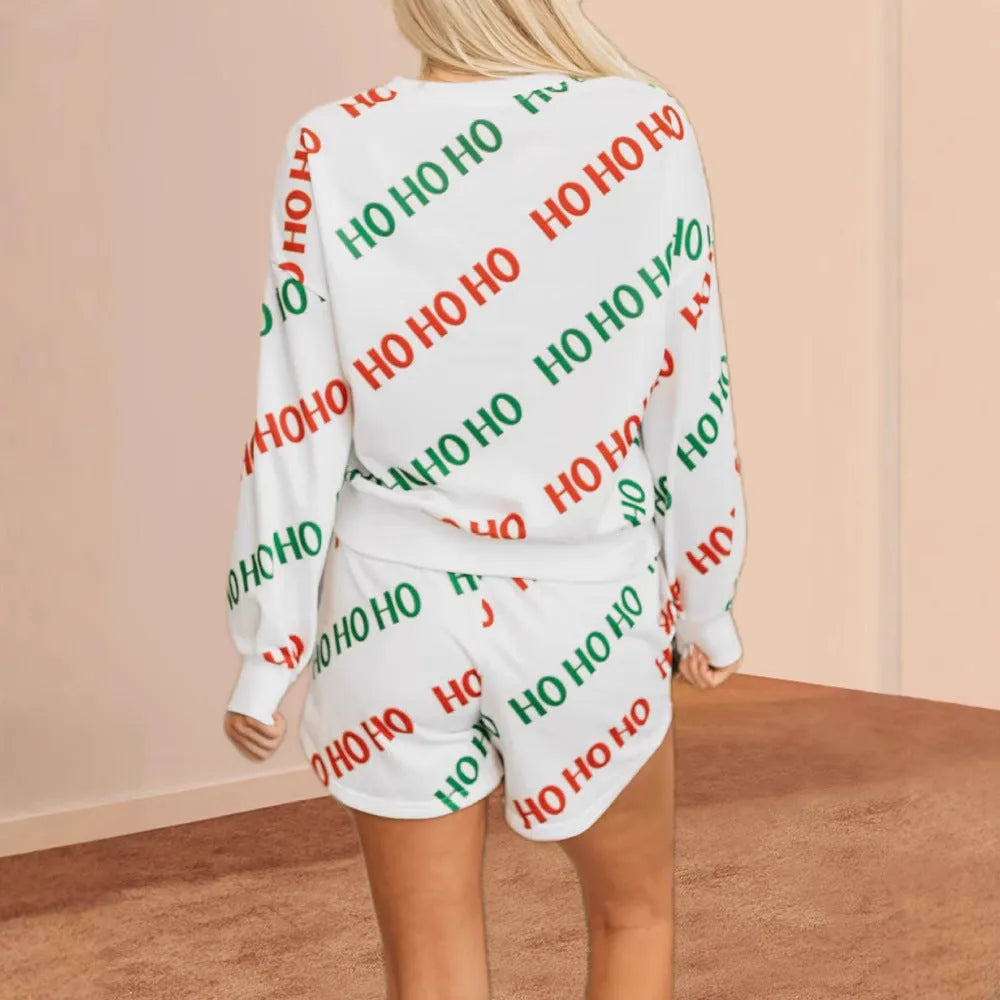 White women's long-sleeved two-piece suit with black letters print and contrast street fashion details.