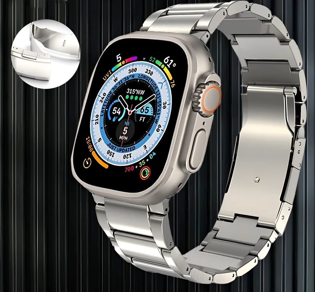 Black titanium metal Apple Watch band with a folding buckle on a table