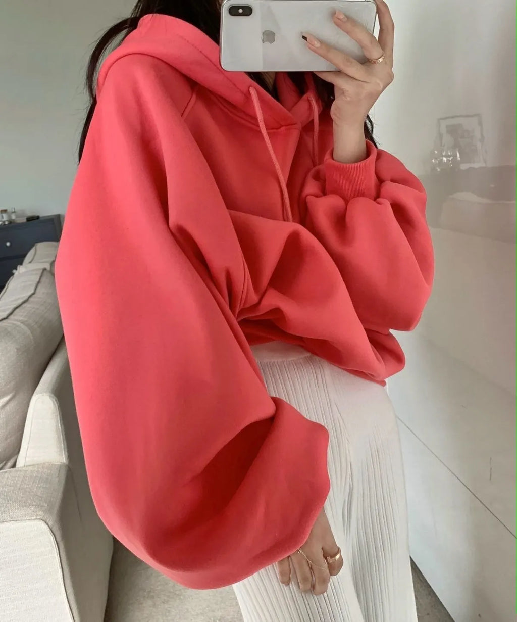 Watermelon red women's sleeveless hooded sweater made from mulberry silk, shown loose fit.