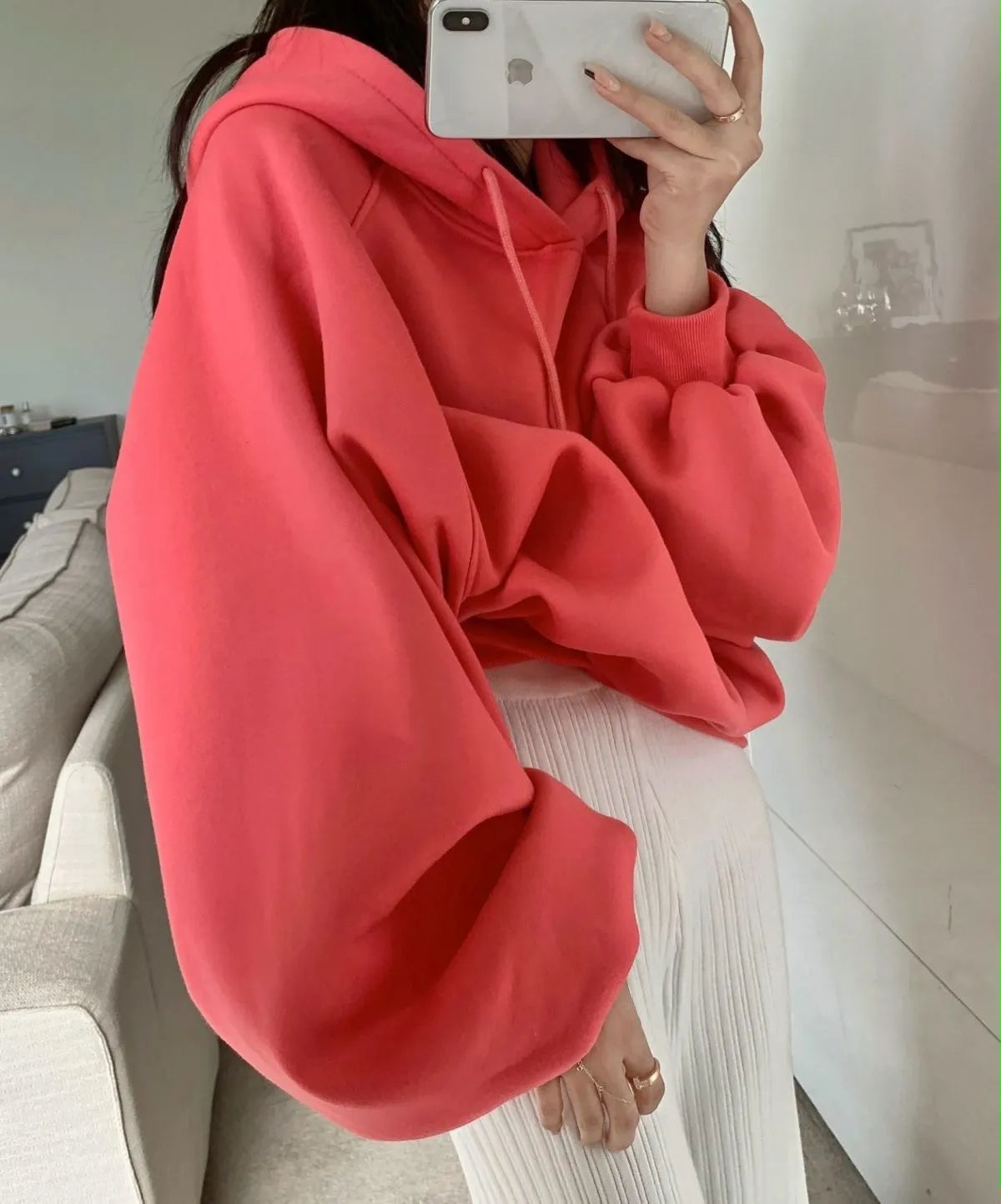 Watermelon red women's sleeveless hooded sweater made from mulberry silk, shown loose fit.
