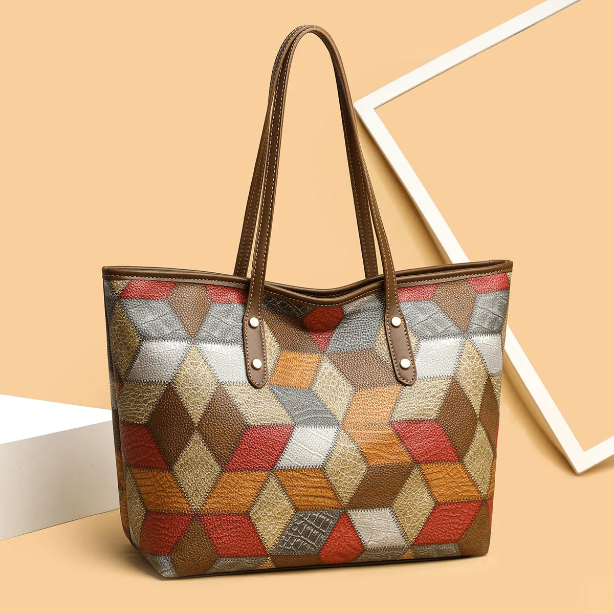 Women's large capacity PVC shoulder handbag in blue brown colour with sandwich pocket organisation