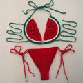 Handmade crocheted two-piece bikini set in mixed colour with lace-up shoulder straps on a model
