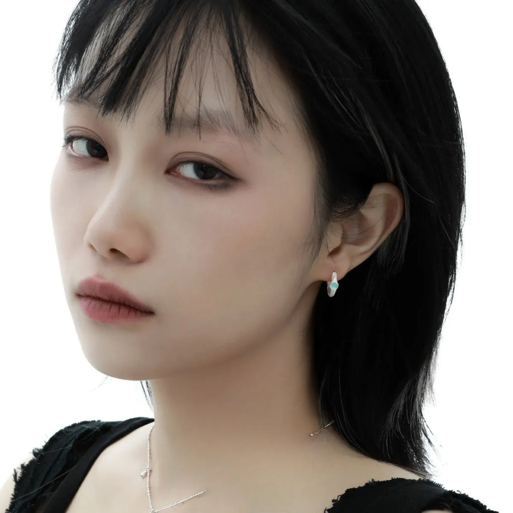 Women's geometric round ear clip in burnt silver 925 silver jewellery