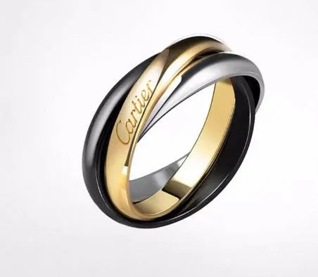 A set of two silver U-shaped geometric couple's rings, one with full diamonds and one plain, on a jewellery display.
