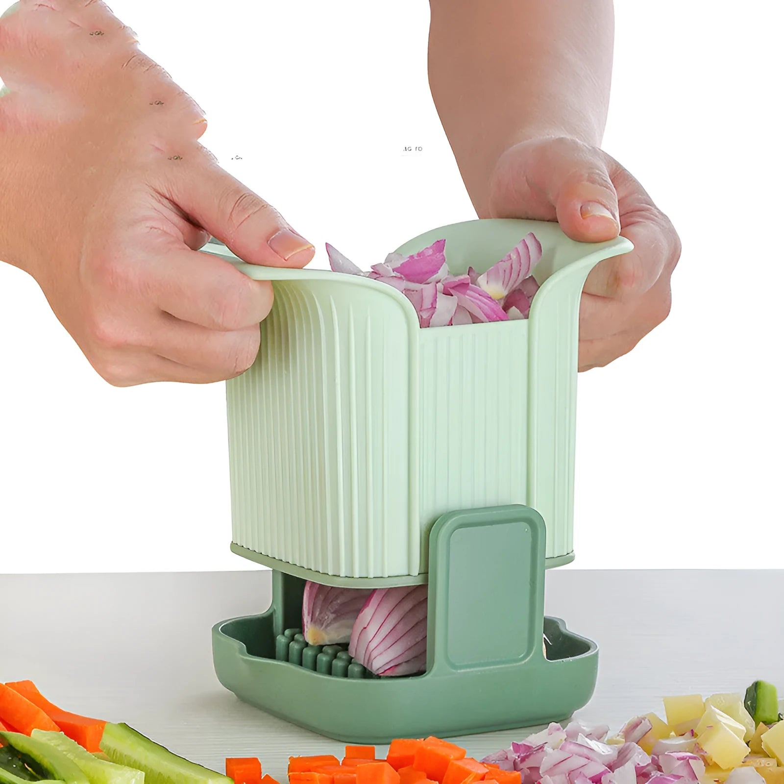 Green handheld multi-functional vegetable chopper with stainless steel blades for onions and potatoes