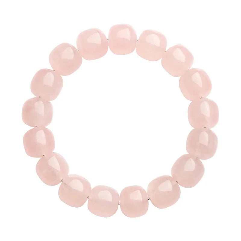 Pink bamboo and crystal barrel bead bracelet with geometric design measuring 11mm to 12mm