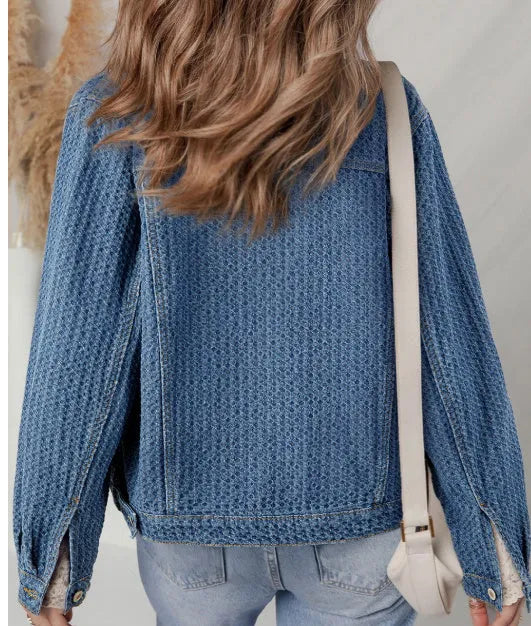 Blue double flap pocket denim textured button down jacket for women front view