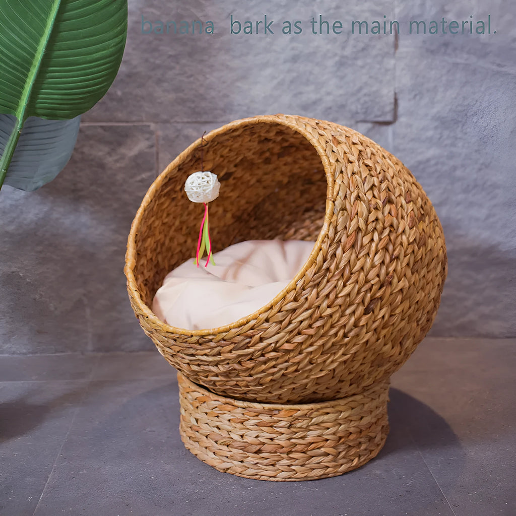 Brown woven rattan cat nest pet bed on floor with compact 50 x 57 cm size