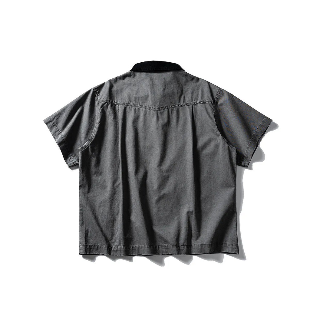 Short-sleeve cotton shirt overalls in a loose cardigan style, shown in khaki and grey colours.