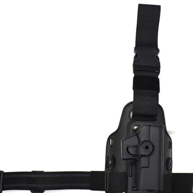 Black tactical plastic leg holster with quick-pull flap and MOLLE webbing on a belt.