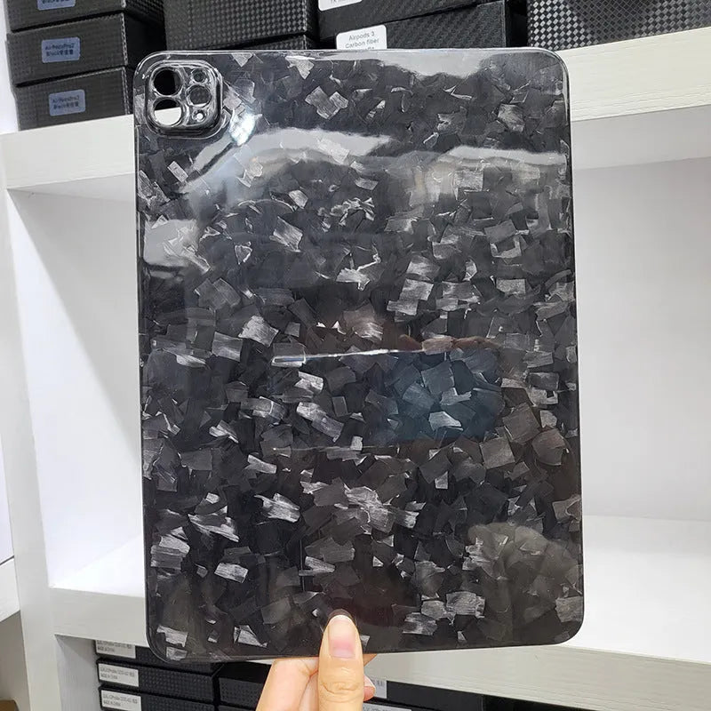 Genuine carbon fibre hard protective case for Apple iPad Pro 11 inch in matte and forged finishes.