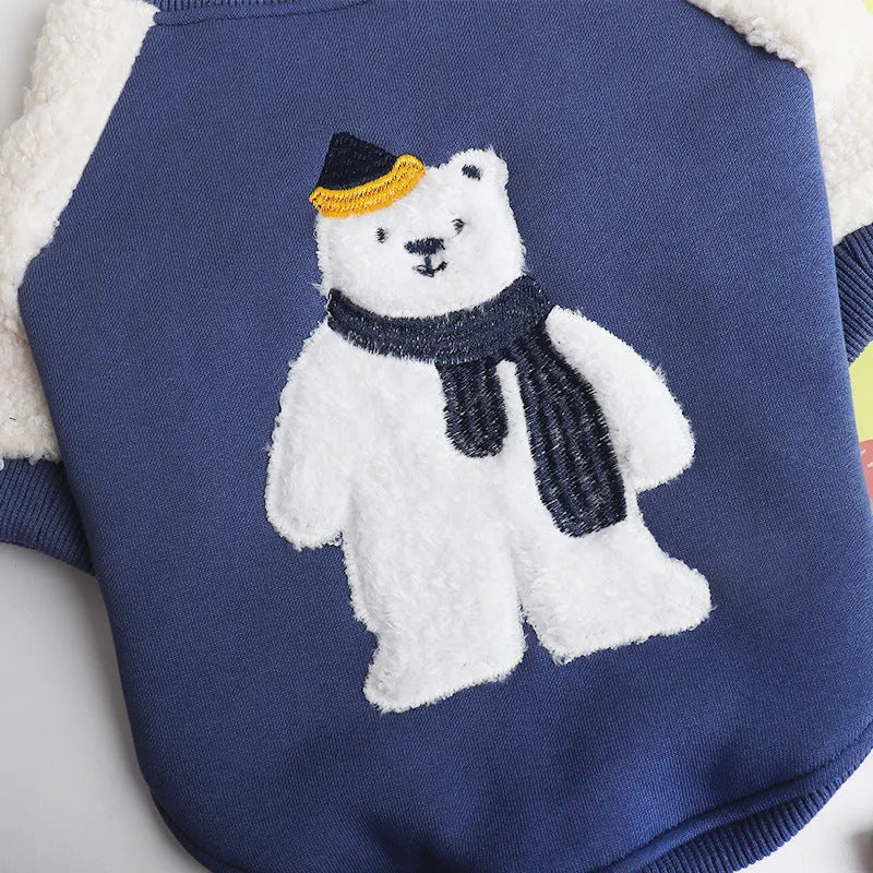 Dark blue fleece-lined winter dog coat shown on a small dog, highlighting the cotton material and thick style.