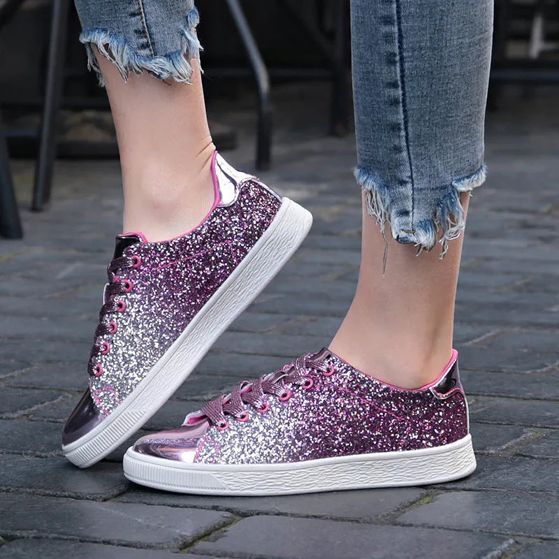 Women's black, pink, and gold sequinned casual lace-up shoes with a round toe and leather lining.