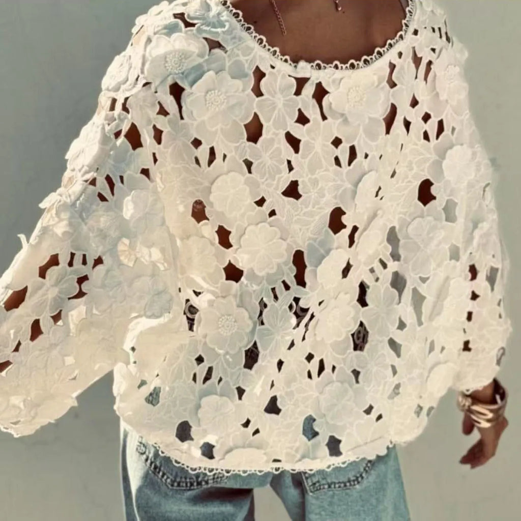 Loose V-neck cardigan with a 3D lace flower decoration in white.