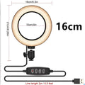 Adjustable live phone stand extended to various heights with mobile phone securely mounted