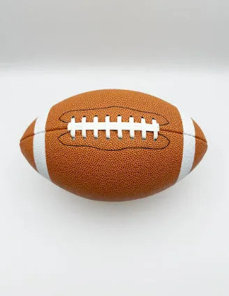 Machine sewn PU children's training American football in brown, shown with stitched seams and pointed ends for practice play