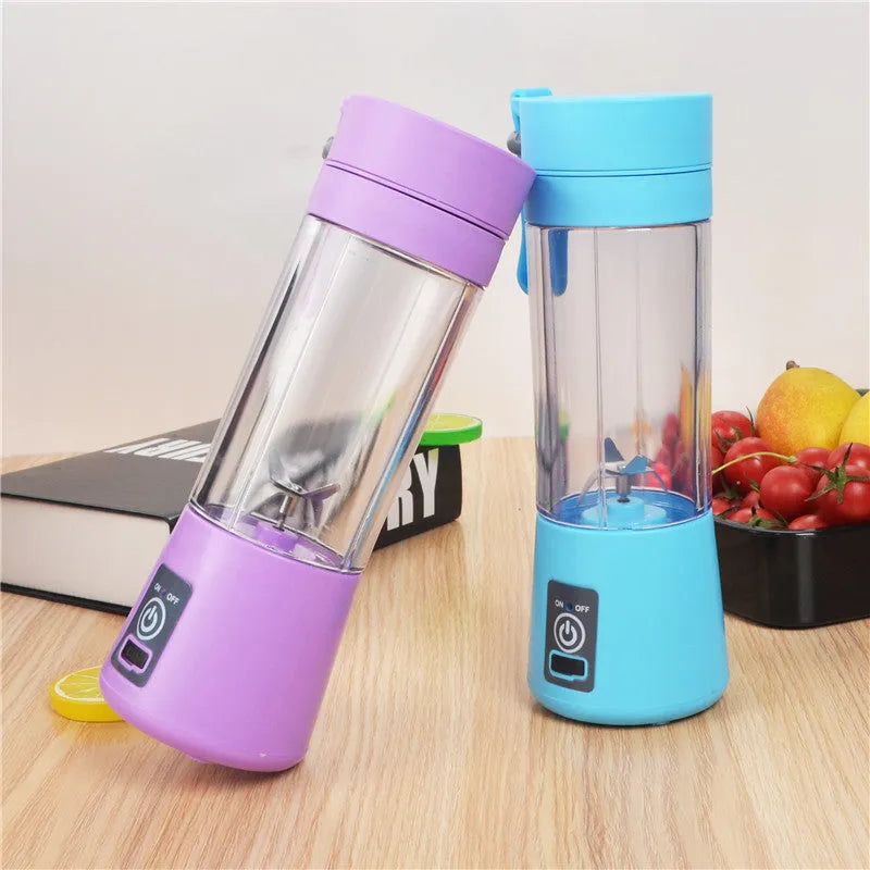 Portable pink USB electric fruit juicer with stainless steel blade and carrying rope
