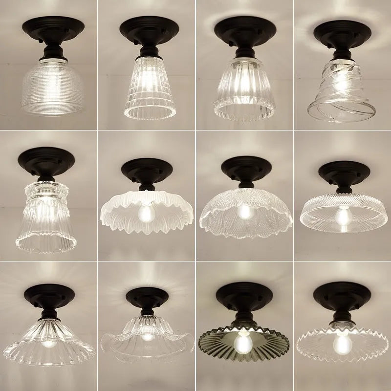 American retro single-head ceiling lamp with clear glass shade showing exposed filament style