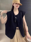 Women's loose fit solid colour polyester vest with pockets in milk white.
