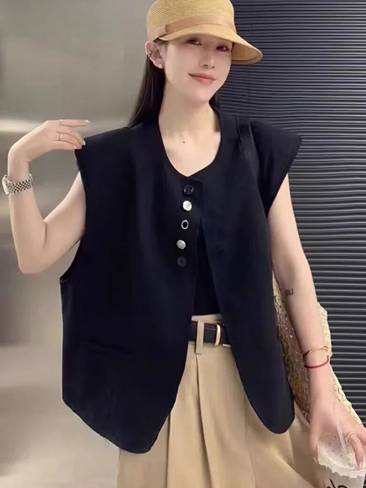 Women's loose fit solid colour polyester vest with pockets in milk white.