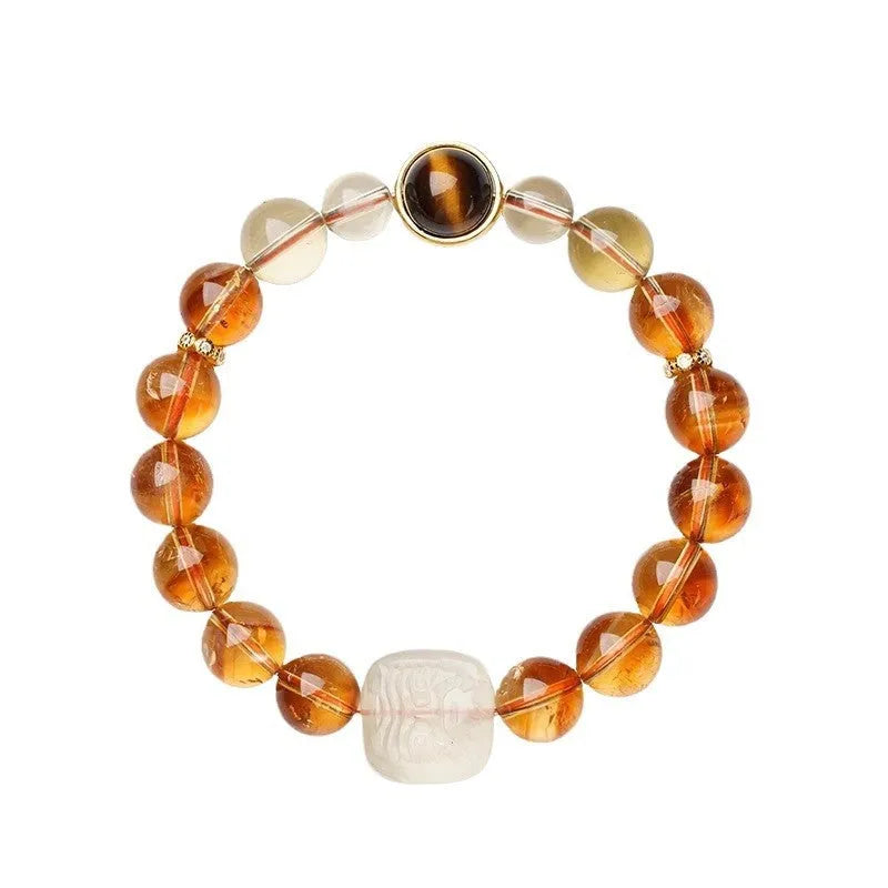 Women's carved citrine bracelet with geometric ethnic patterning, 10mm crystal construction