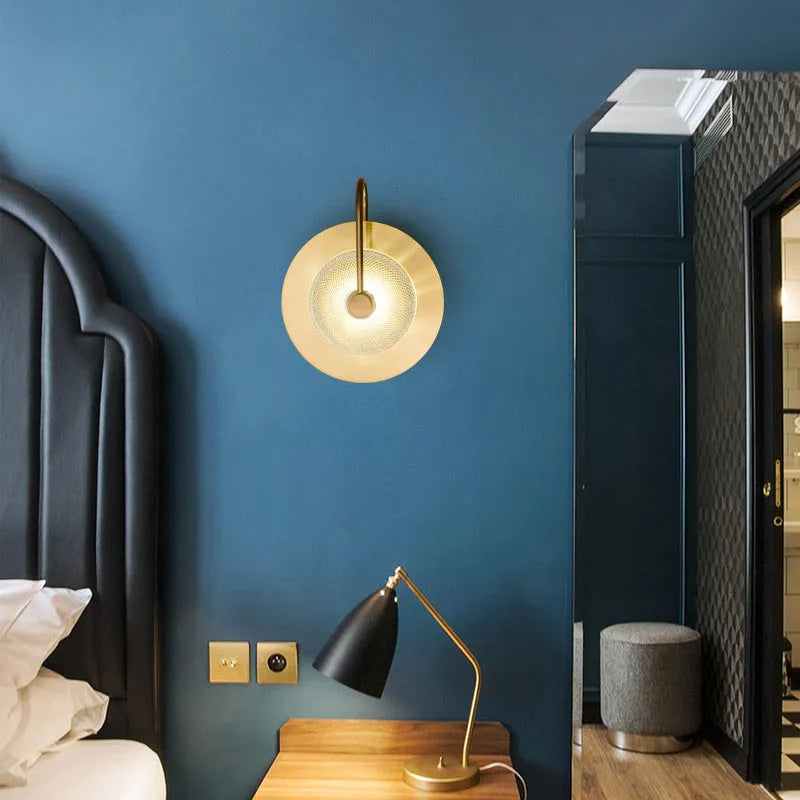Modern simplicity wall lamp with clear glass shade on wall in living room background