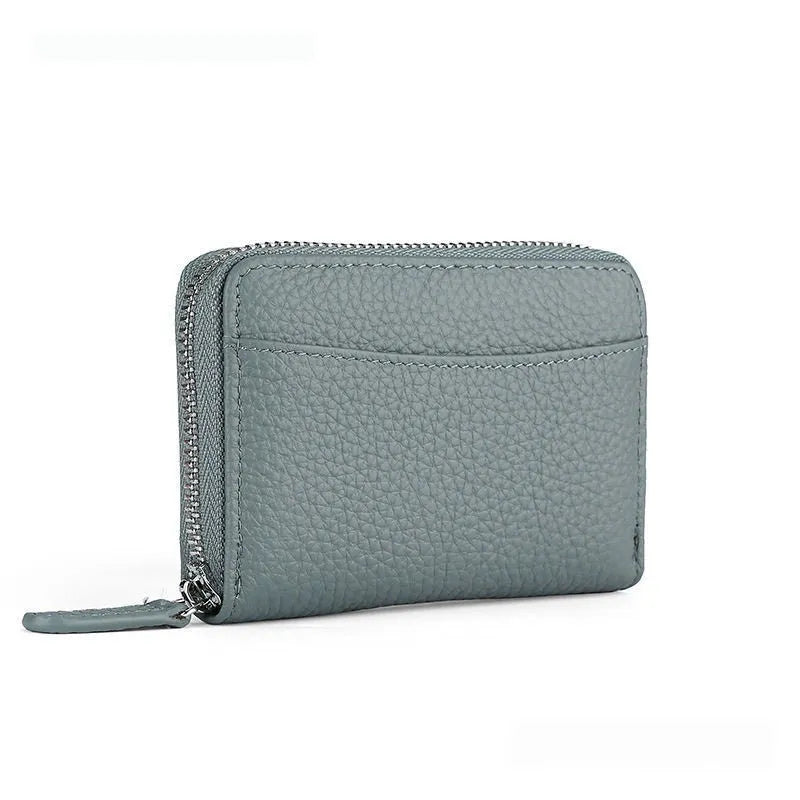 Genuine leather zip coin purse in a choice of solid colours on a plain background.