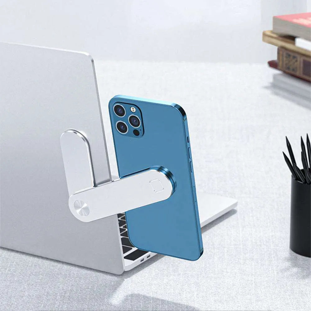 Black magnetic laptop phone holder attached to computer monitor with smartphone mounted