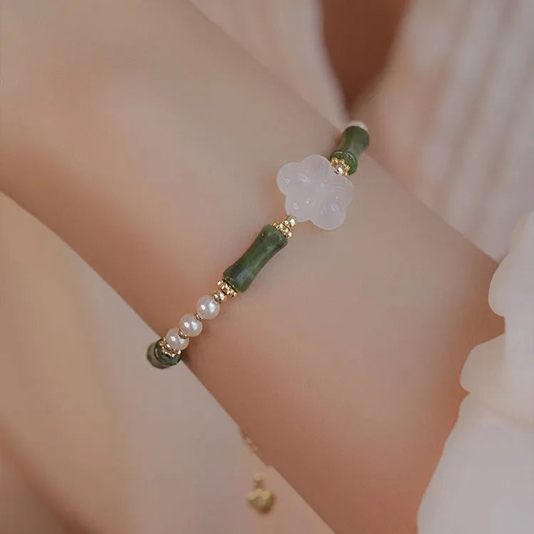 Chinese style bamboo joint bracelet with shell pearls, Hetian jade, and copper connectors