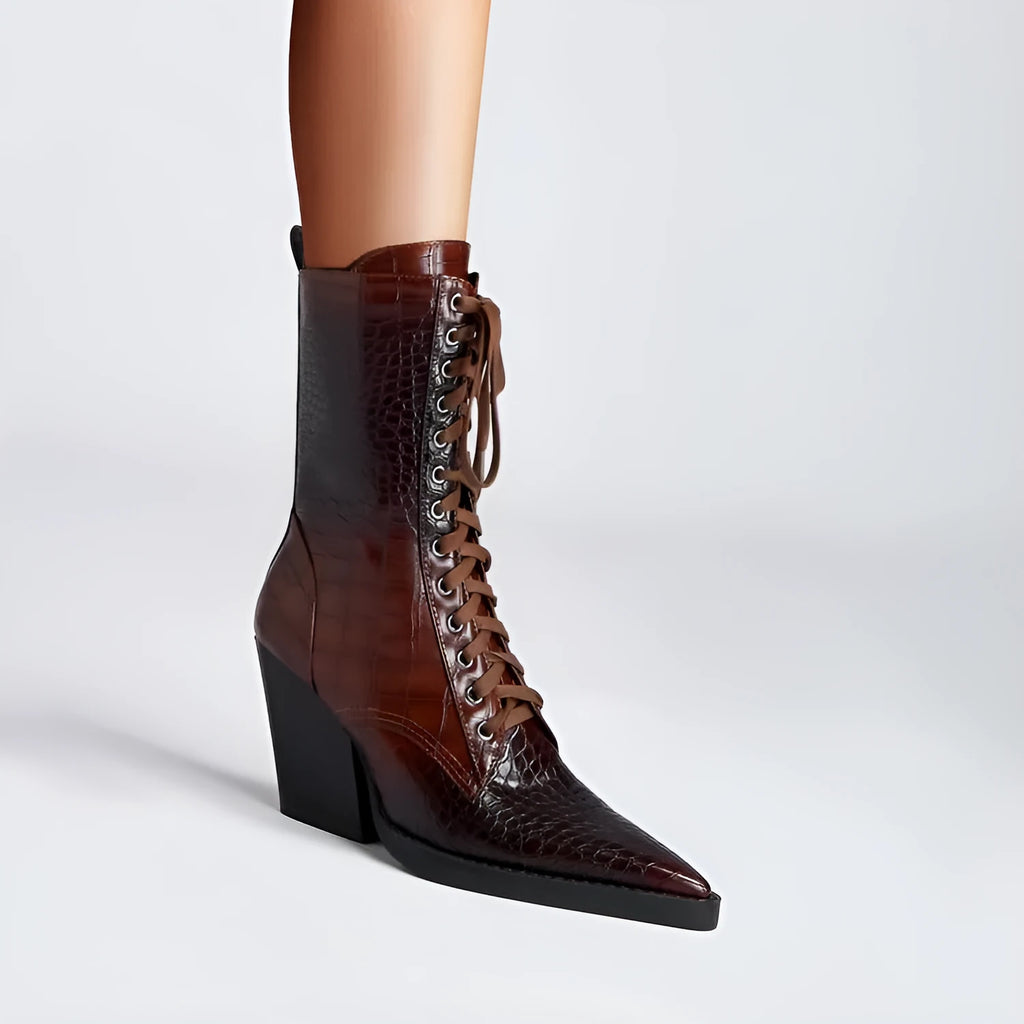 Dark brown women's pointed toe ankle boots with a chunky heel and side zip.