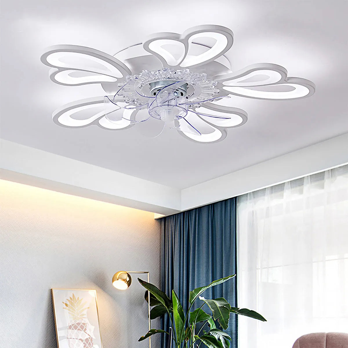 Modern white and black framed ceiling fan light with floral design blades and integrated acrylic light shade