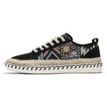 Men's summer casual shoes in beige and black with cloth uppers and slip-on design