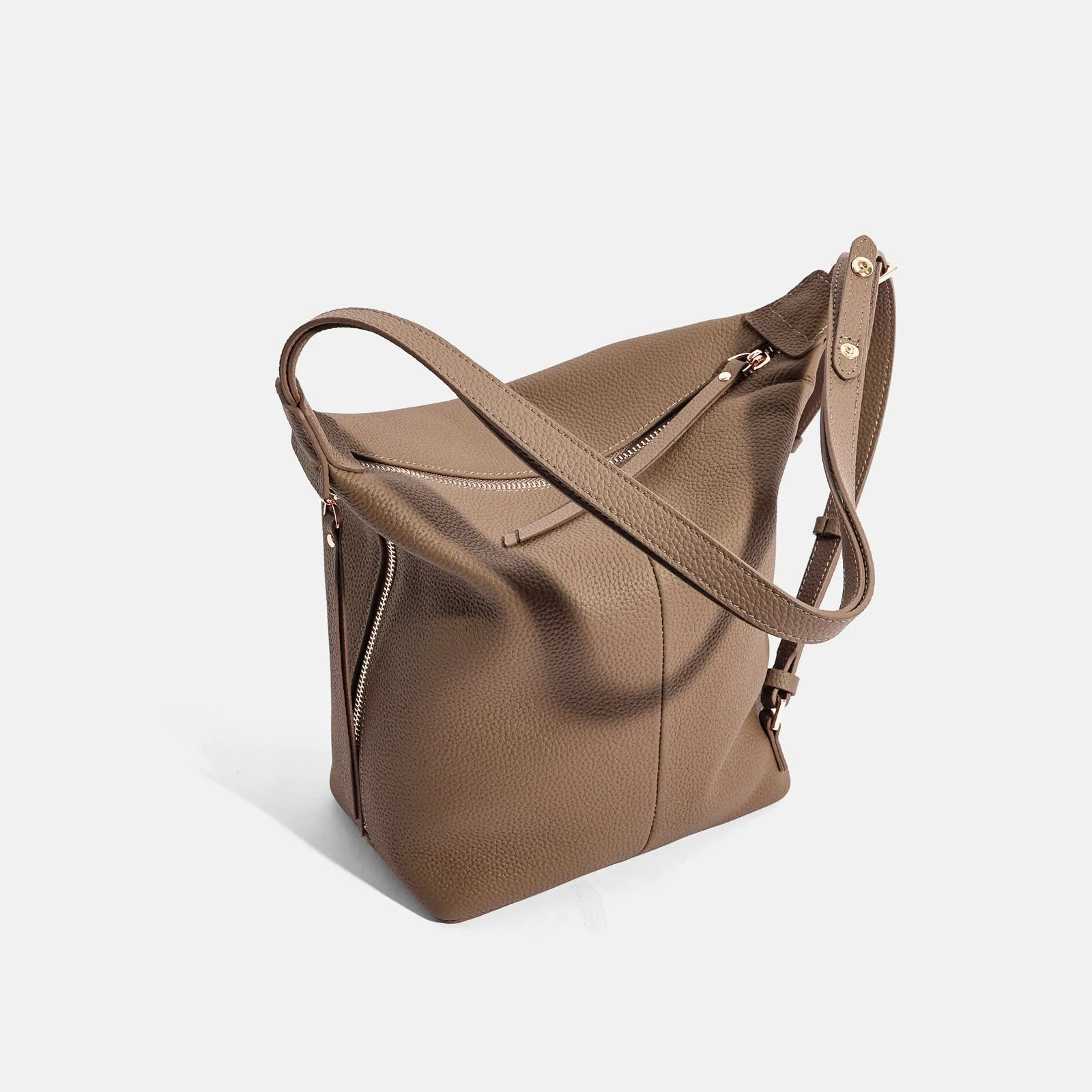 Women's soft genuine leather bucket shoulder bag in elephant grey colour showing casual style and large capacity