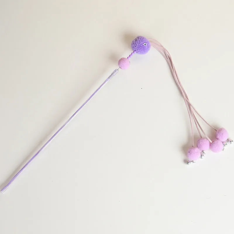 Flexible cat wand toy with colourful tassel attachment for interactive indoor play sessions