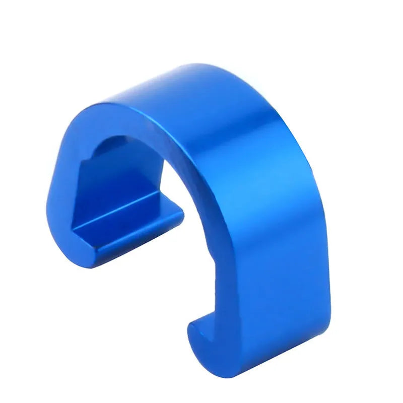 Ten small aluminium C-shaped buckles in assorted colours including black, blue, gold, and red.