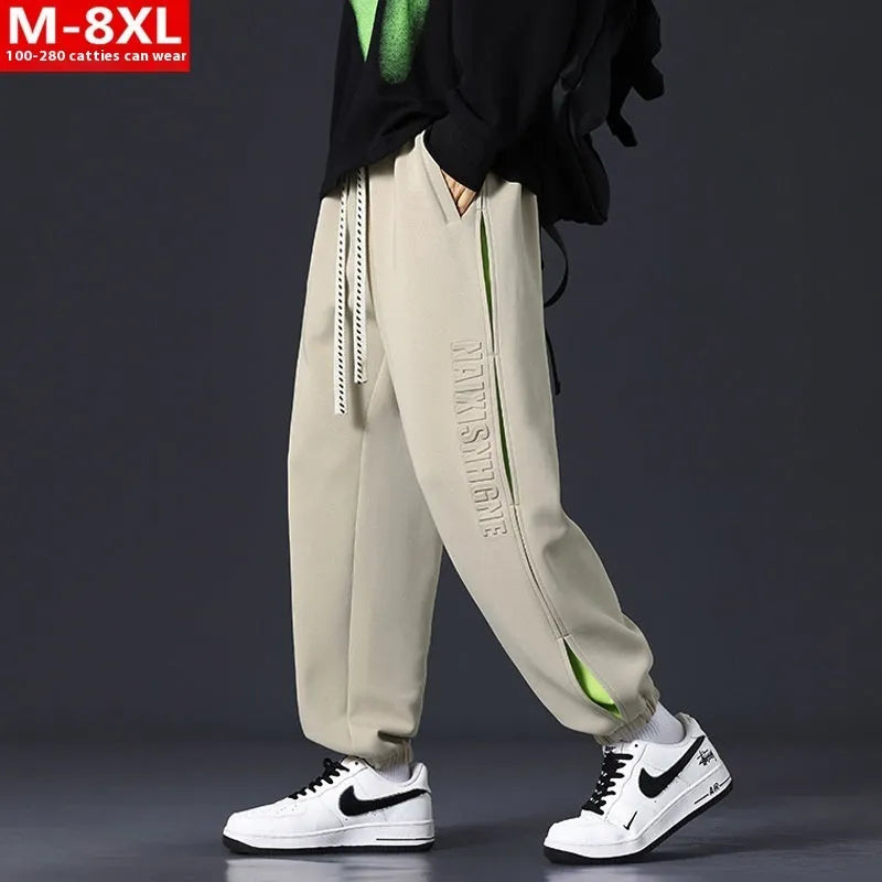 Men's cotton pants with ankle banded design and stitching details in black colour