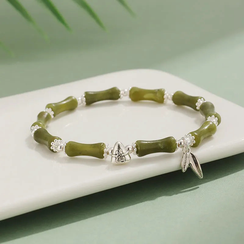 Green aventurine bamboo strawberry crystal bracelet with electroplated finish on adjustable elastic cord