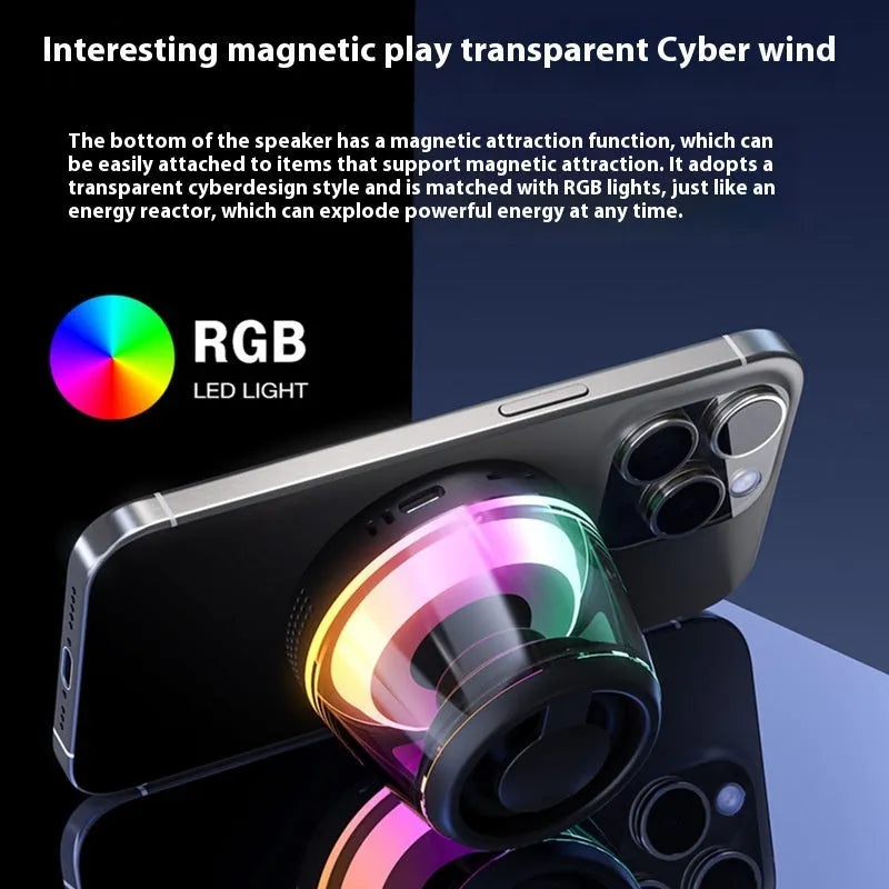 Black portable Bluetooth mini speaker with ambient light on a metallic surface, showing its magnetic base.