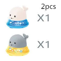 Automatic water spray whale bath toy with LED lights for baby sensory play