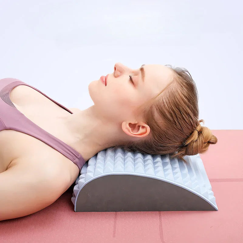 Blue EVA foam back stretcher pillow for lumbar and neck support on a flat surface.