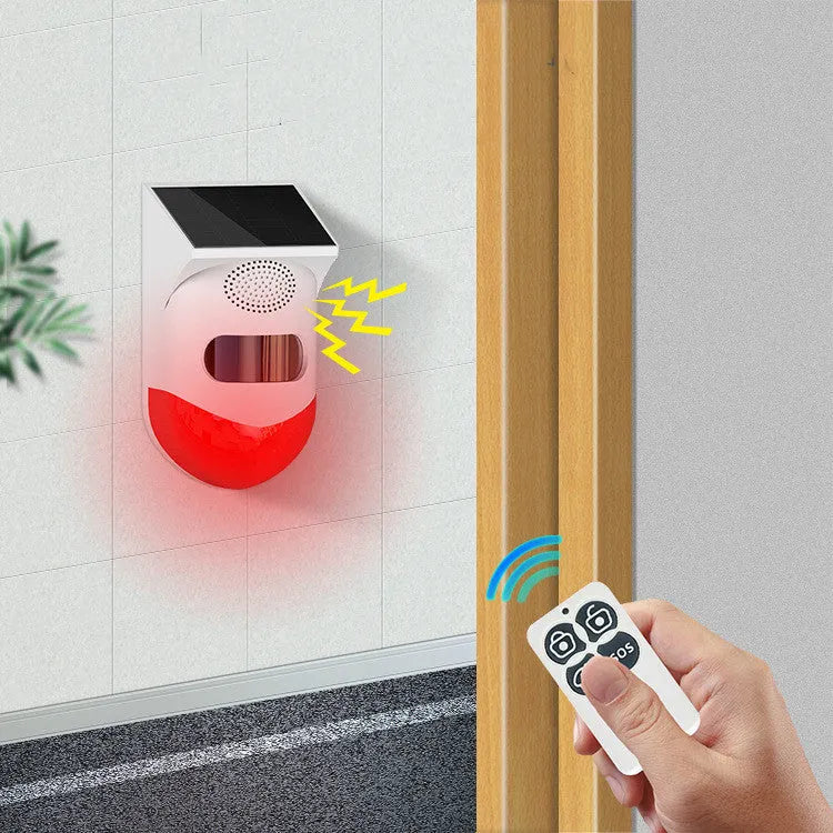 Solar-powered wireless security alarm with infrared sensor for outdoor property protection